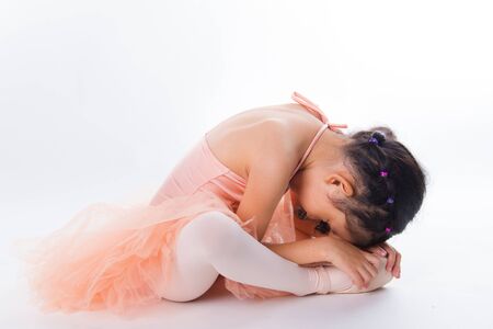A little ballerina in the studio. On White Backgroundの写真素材