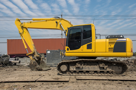 Big excavator on new construction siteの写真素材