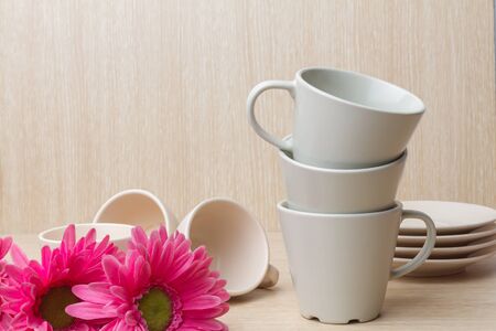 Coffee cup collection on wooden backgroundの写真素材