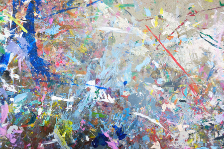 Strain of watercolor splash on the workshop table, abstract backgroundの写真素材