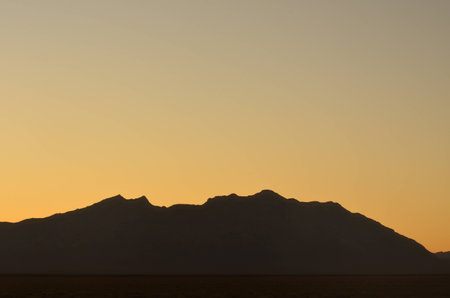 Yellow Sunset over Zagros Mountains in Iranの写真素材