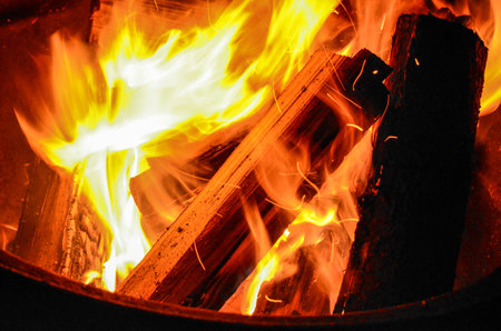 Burning Firewood at a Campgroundの写真素材