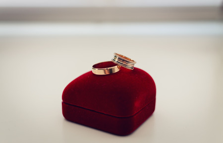 Wedding rings on a boxの写真素材