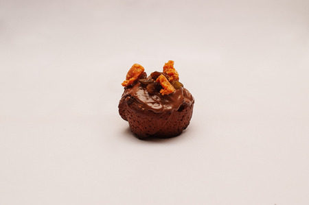 Chocolate cupcakes with filling isolated on a white background