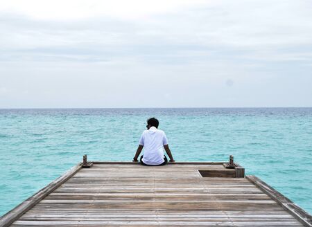 Traveller By the Sea at Maldivesの写真素材