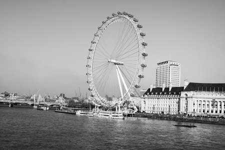 London, UK, March 2018 : Black and White Photo of the London Eye Shot From a Distance. On the banks of River Thamesのeditorial素材