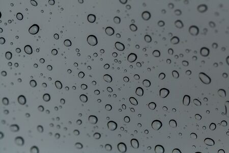 water drop on glassの写真素材