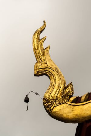 golden naga wood in temple of the north thailand, chiang maiの写真素材