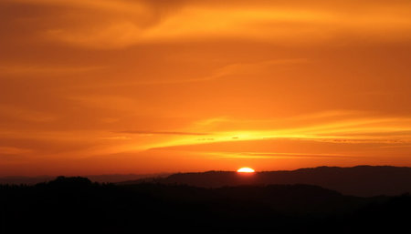 Glowing sunset across jungle hillsの素材