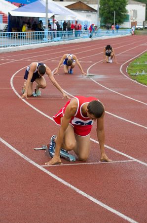 CHERNOGORSK, RUSSIA - JULY 4: Chernogorsk, athletics. Men on the starting line. July 4, 2010 in Chernogorsk, Russia.のeditorial素材