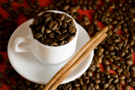White cup with coffee beansの写真素材