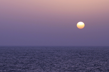 Sunset over the open oceanの写真素材