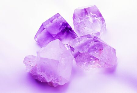 Purple mauve Amethyst colored quartz rock crystalsの写真素材