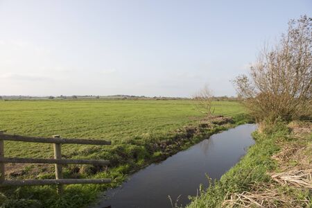 Drainage ditch on farmland in Somerset Englandの写真素材