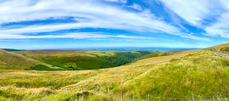 The famous Isle of Man TT mountain road looking towards the coastal town of Ramseyの写真素材