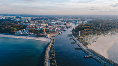 Lighthouse and harbor in Kolobrzeg, Poland. Baltic sea.の写真素材