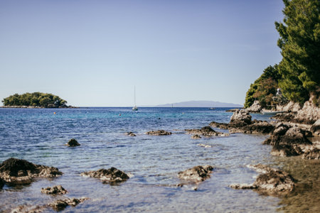 Rocky beach in the small picturesque town of Zuljana in Croatia.の写真素材