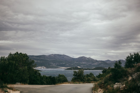 Mountain road over the abyss near Orebic in Croatia.の写真素材
