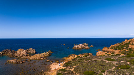 The rocky and sandy beach of Di Cala in the north-west of Sardinia. Drone photos taken on a sunny day. A sunny day at the end of September.の写真素材