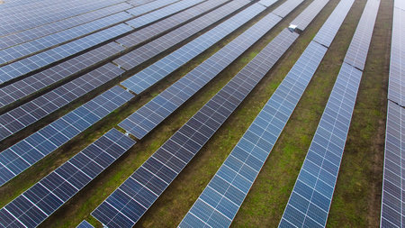 A picture showcasing a vast, contemporary photovoltaic solar farm.の写真素材