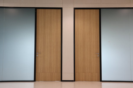 Closed and closed door in modern office building, interior design conceptの写真素材