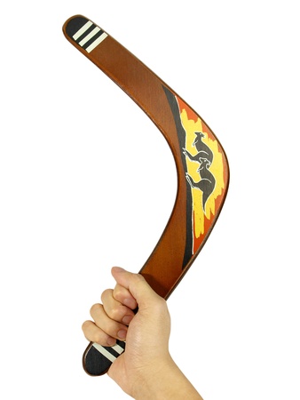 Hand with kangaroo painted boomerangの写真素材