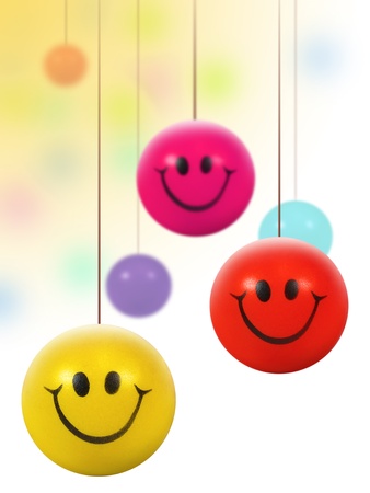hanging colorful smiley ballsの写真素材