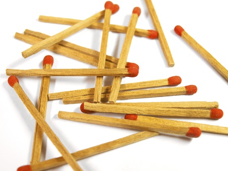 red matches close up on white background