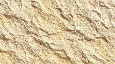 This image features a detailed texture of a natural beige stone surface, showcasing subtle variations and patterns. Ideal for backgrounds in design.の素材