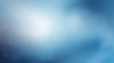 This abstract blue background features soft light and subtle gradients, creating a calming and serene atmosphere perfect for artistic projects and designs.の素材