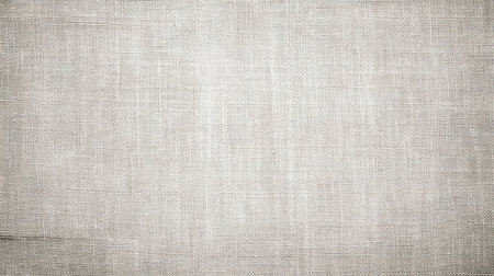 A soft light beige textured fabric background ideal for various design projects, crafts, and photography. Perfect for adding warmth and elegance.の素材