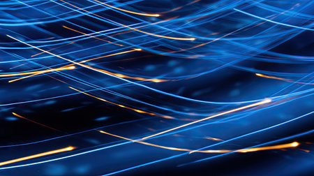 This abstract image showcases dynamic blue light trails against a dark backdrop, emphasizing vibrant motion and energy. Perfect for artistic projects.の素材