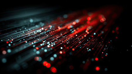 This abstract image showcases luminous light trails in red and blue against a dark backdrop, creating a dynamic visual effect perfect for digital art themes.の素材