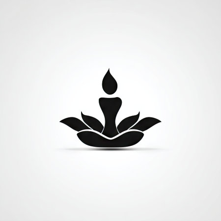 This minimalist silhouette depicts a person meditating with a flame above and lotus petals below. It conveys peace, balance, and spiritual growth.の素材