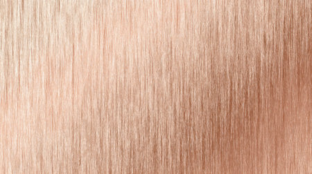 This image features an elegant rose gold metal texture showcasing smooth brush strokes. It serves as a striking background for various design projects.の素材