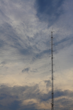 Phone antenna tower of the base phone station on skyの写真素材