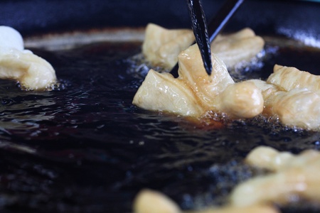 Deep-fried dough stick frying panの写真素材