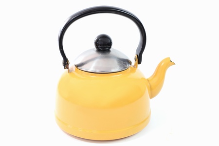 Yellow kettle isolated white backgroundの写真素材