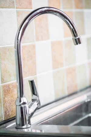 Stainless steel kitchen faucet and sinkの写真素材