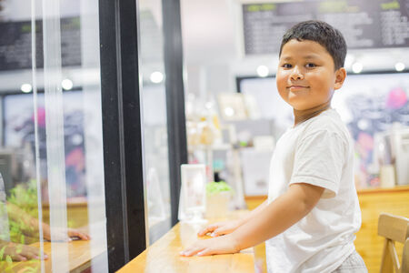 close up portrait of cute asian boyの写真素材