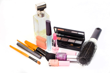 cosmetics isolated on white background. Pink lipstick, mascara,