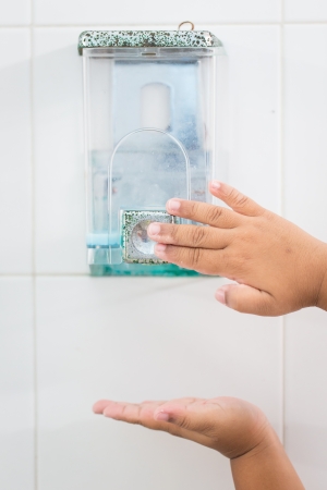 Cleaning hand gel in a box ready to use by pumping the image isolatedの写真素材