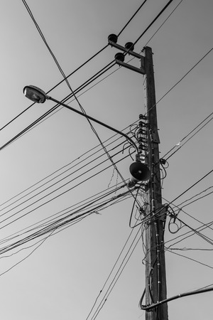 Electricity poles on colorful skyのeditorial素材