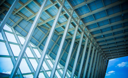 New residential construction home metal framing against a blue skyの写真素材