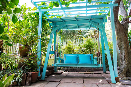 Blue swings in the parkの写真素材
