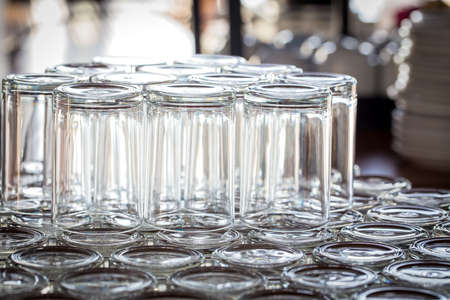 Row of water glasses on the tableの写真素材
