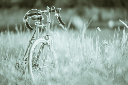 Beautiful landscape image with Bicycle at sunsetの写真素材