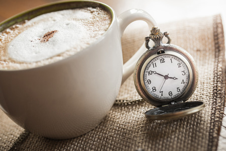 Pocket watch and coffee cup,Retro - vintage