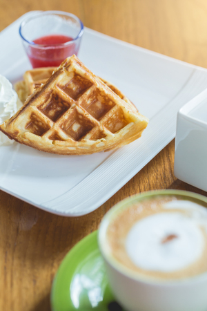 breakfast : waffles with strawberriesの写真素材