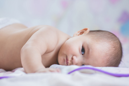 bright portrait of adorable babyの写真素材